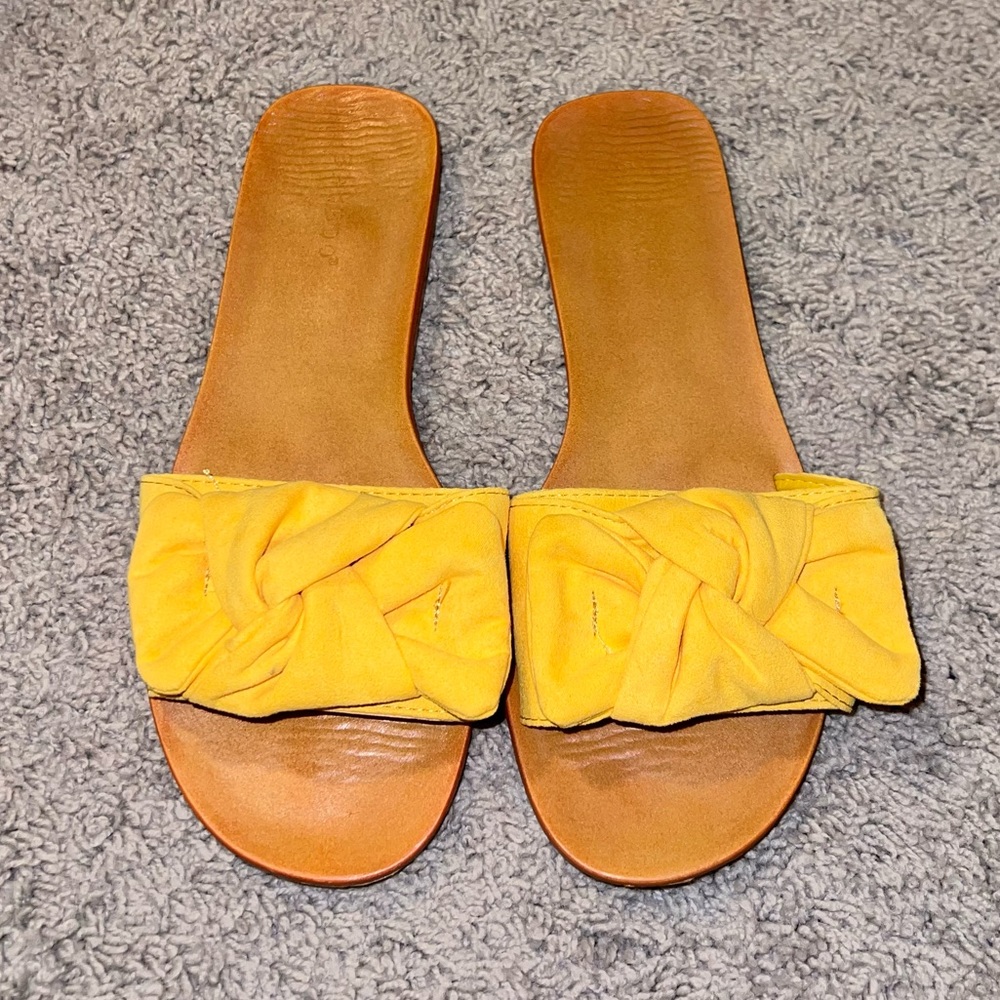 Yellow slip-on sandals
